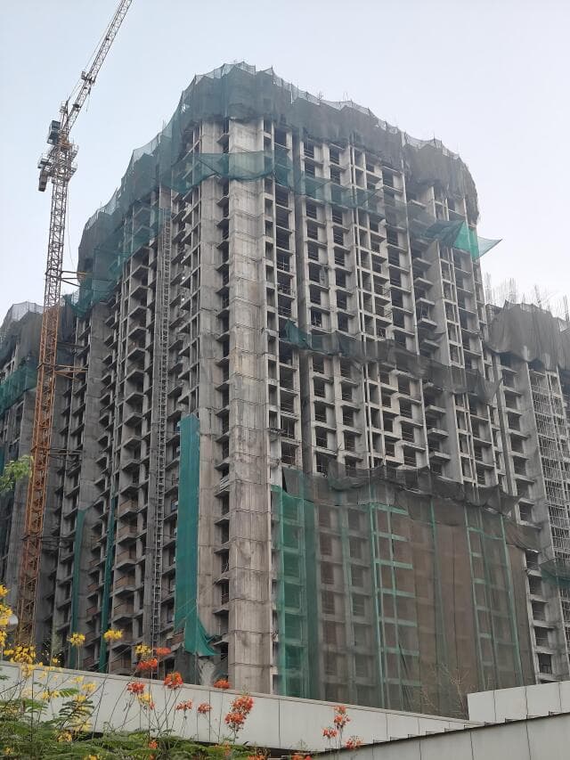 Completed Monolithic Concrete High-Rise Tower Facade
